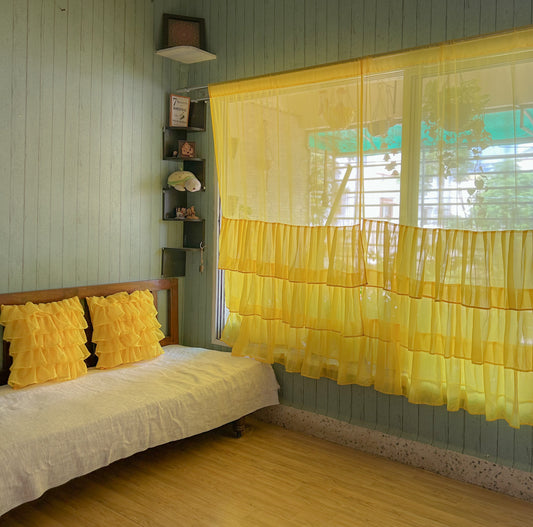 Yellow bottom ruffled curtains